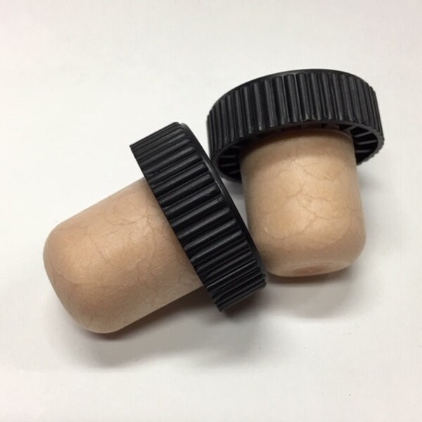 Black ribbed plastic stopper